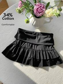 Pantalones cortos de falda con cintura baja y dobladillo con volantes, de color liso - Negro - Ver 1