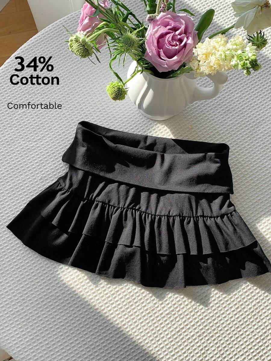 Pantalones cortos de falda con cintura baja y dobladillo con volantes, de color liso - Negro - Ver 1
