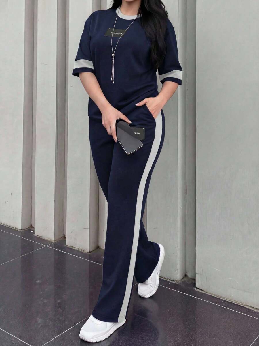 2 piezas Conjunto de camiseta de manga corta de cuello redondo y pantalones sueltos de cintura elástica para mujer, uso diario casual elegante de verano en color negro - Azul oscuro 24 - Ver 1