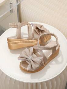 1 Pair Gold Kids Wedge Platform Sandals, Glittery Soft Luxurious PU Fabric, Rhinestone Bow Back Strap Decor, Back Heel Wrap, PU Metal Buckle Design, Round Toe Open Toe, Lightweight Bouncy Thick Sole Height Increasing, Fashion Princess Style Casual Sandals, Suitable For 3-15 Years Old, Daily, Party, Casual, Vacation, Beach, Outdoor, Spring/Summer New 2026 - Gold - View 5