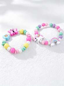 Set di 3 braccialetti in perline di legno con unicorno e farfalla per bambini, braccialetti elastici con ciondoli floreali arcobaleno, gioielli carini a tema cartoni animati, regali di amicizia per ragazze - Multicolore - Visualizzare 4