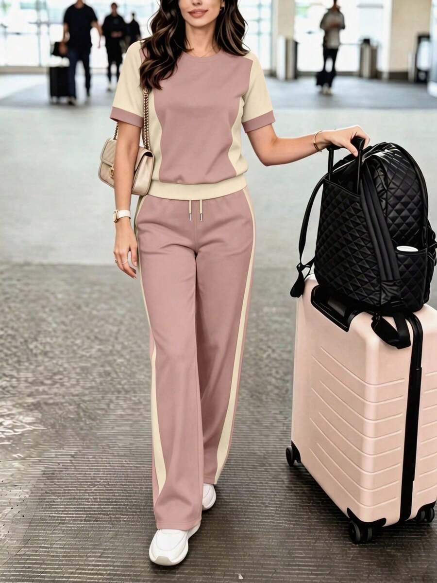 color block, y pantalones rectos de cintura alta y sueltos.Conjunto de camiseta y pantalones de color block.Atuendo de vacaciones, ropa de viaje, estilo de playa, ropa minimalista de resort. - Albaricoque - Ver 1