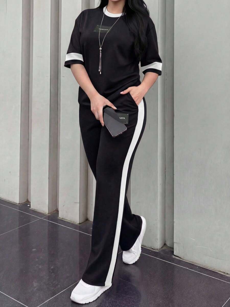 2 piezas Conjunto de camiseta de manga corta de cuello redondo y pantalones sueltos de cintura elástica para mujer, para uso diario casual y elegante en primavera/otoño - Blanco y Negro - Ver 1