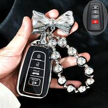 時尚金屬蝴蝶結吊飾汽車鑰匙套 2018-2022，適用於 RAV4、Camry、Corolla、Avalon、Prius、GT86、Highlander、C-HR，全包防摔防震耐刮遙控保護殼 - 豐田鑰匙殼搭配時尚金屬感蝴蝶結掛件 - 查看 1