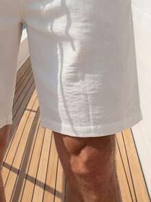 Pantalones cortos casuales versátiles de uso diario para hombre, unicolor, con botones, media abertura, cintura elástica y bolsillos - Blanco - Ver 5
