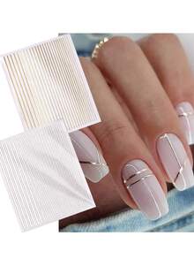 2 fogli 52 pezzi Adesivi per unghie fai-da-te a righe oro e argento metallizzati con motivi geometrici e a onde, decalcomanie per arte di unghie autoadesive e trasferibili, forniture per unghie, adesivi per unghie a righe 3D oro e argento, nastro metallico a righe, decalcomanie per arte di unghie di varie dimensioni - Dorato - Visualizzare 1