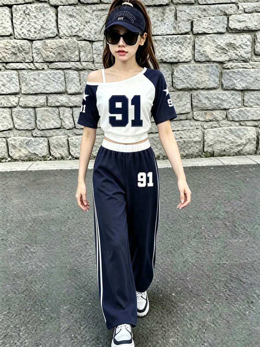 Bộ quần áo tay ngắn in họa tiết số vai lệch cho bé gái tuổi mới lớn - Xanh đậm - Xem 1
