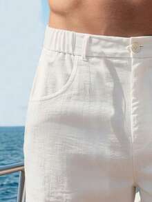 Pantalones cortos casuales versátiles de uso diario para hombre, unicolor, con botones, media abertura, cintura elástica y bolsillos - Blanco - Ver 3