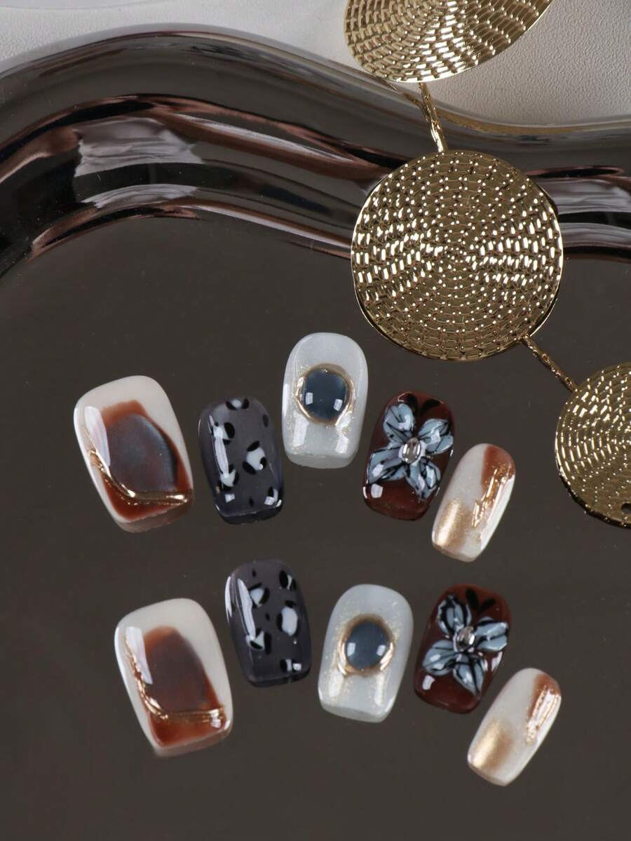 10 piezas de uñas postizas para pegar, blancas, marrones y azules con efecto ojo de gato y flores, uñas cortas falsas artificiales, kit de suministros de uñas postizas que incluye 1 hoja de pestañas adhesivas y 1 lima mini, hechas a mano - Multicolor - Ver 1