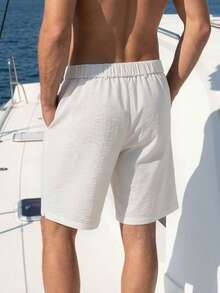 Pantalones cortos casuales versátiles de uso diario para hombre, unicolor, con botones, media abertura, cintura elástica y bolsillos - Blanco - Ver 2