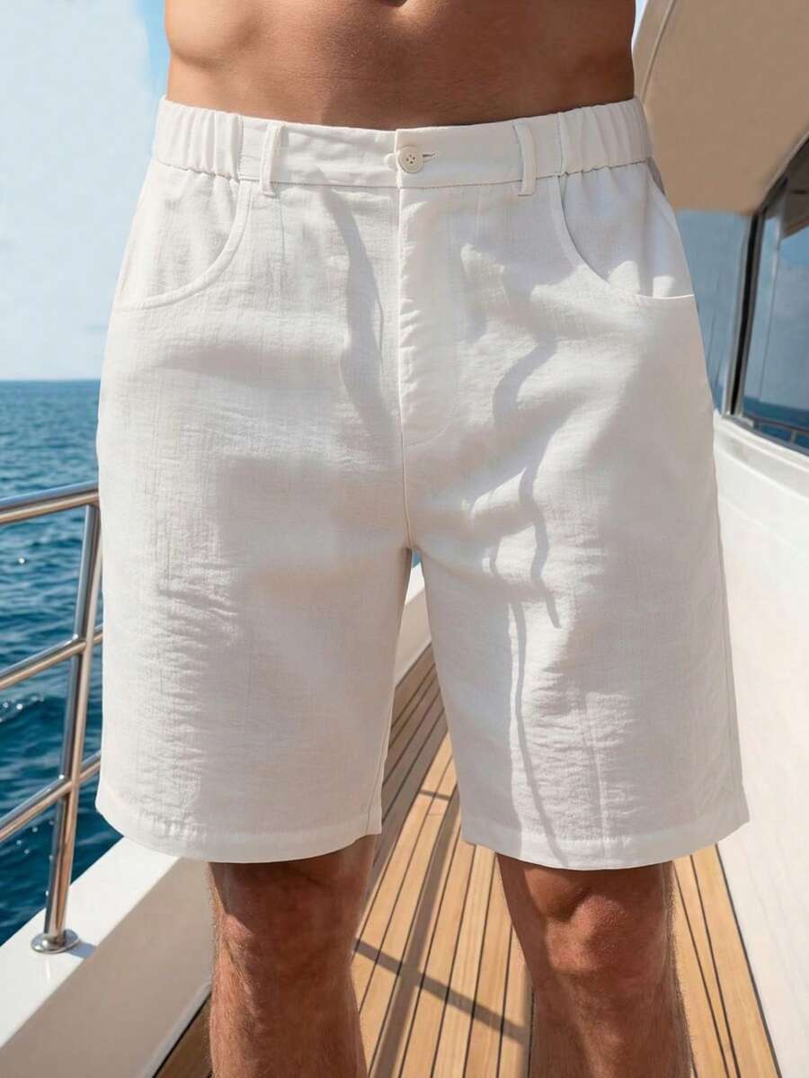 Pantalones cortos casuales versátiles de uso diario para hombre, unicolor, con botones, media abertura, cintura elástica y bolsillos - Blanco - Ver 1