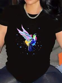Una camiseta de manga corta ligera y cómoda con un colorido diseño de colibrí, fabric con tela duradera. I para uso diario, salidas informales o cenar en casa o en restaurantes. - Negro - Ver 2