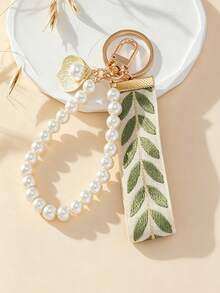 Llavero de cinta bordada fresca con pulsera de perlas, llavero elegante de perlas de concha, accesorio de llavero de moda para mujer - Llavero tejido - Ver 2