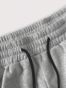 Pantalones largos deportivos hombre, pierna recta, estampado llamas. Tallas S-2XL, poliéster ajuste regular, estilo urbano. Cómodos para diario y jogging.. - Gris Claro - Ver 4