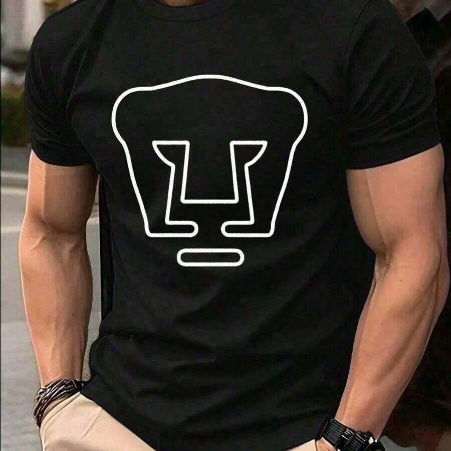 Camiseta Oversized de algodón con estampado del escudo de Pumas UNAM en blanco sobre fondo negro. Estilo minimalista y streetwear, cómodo y transpirable, ideal para fans del fútbol mexicano y Pumas. - Negro - Ver 1