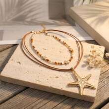 2pcs/Set Kalung Manik-Manik Buatan Tangan Gaya Bohemian Bertingkat dengan Liontin Bintang Laut, Cocok untuk Pemakaian Sehari-hari, Perjalanan, dan Acara Kumpul-kumpul, Arah Bintang Laut Acak - MultiWarna - View 2