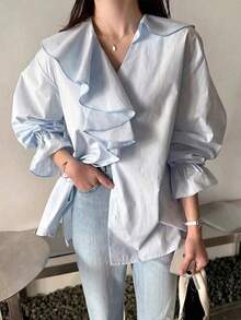 Blusa holgada con cuello en V, parches y volantes en el bajo - Azul - Ver 1