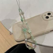 Laccetto per telefono con sfumatura verde menta fresco, perline opache e colorate abbinate a perline di riso verdi con fiocco, ciondoli a stella d'argento cava e cuore trasparente, schema di colori verde chiaro e rosa rinfrescante e curativo. Laccetto fine, robusto e durevole, può essere utilizzato per appendere telefono, chiavi, borsa a spalla, accessorio di nicchia in stile giapponese delicato, versatile per primavera ed estate, adatto per uso personale o come regalo - Verde - Visualizzare 3