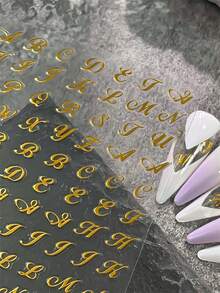 6入組 混合3D鍍金金色英文字母美甲貼紙 金屬金色哥德式字母藝術字母美甲貼花 自黏式復古金色字母美甲貼片 - 金色 - 查看 6