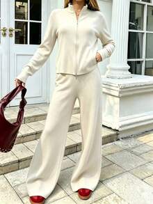 Conjunto feminino casual elegante e discreto de duas peças, composto por blusa de manga comprida com gola e zíper e calça pantalona, tecido altamente elástico para outono e inverno. - Branco - Visão 1