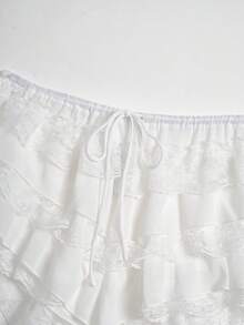 Pantalones cortos de mujer para verano, casuales, de vacaciones, color liso, con encaje, volantes multicapa y cintura con cordón - Blanco - Ver 9