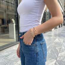 Bộ 2 vòng tay nữ dây xích lưới đính đá rhinestone hình nút thắt trái tim và biểu tượng vô cực - Bộ 2 món hình số 8 đính đá hình trái tim thắt nút màu vàng. - Xem 1