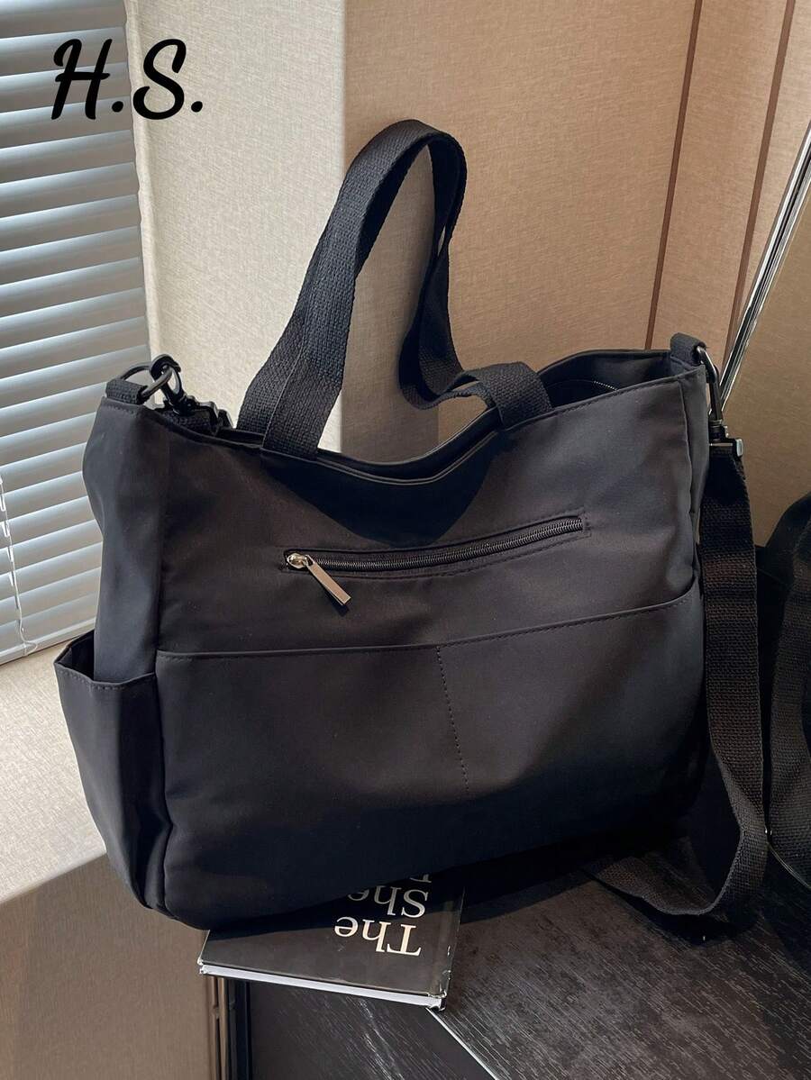 简约多口袋大容量通勤手提包，女士休闲百搭帆布单肩包，轻便可折叠，肩带可拆卸，拉链封口，适合日常使用、工作、上学、大学等场合。