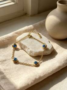 Spiral Frame Blue Gemstone Exquisite Chain Bracelet, Titanium Steel Gold Plated, Vintage French Minimalist Wrist Accessory, Hypoallergenic Adjustable Bracelet - Evil Eye Bracelet - View 3
