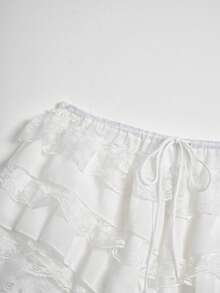 Pantalones cortos de mujer para verano, casuales, de vacaciones, color liso, con encaje, volantes multicapa y cintura con cordón - Blanco - Ver 8