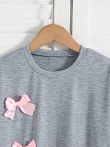 Conjunto de 2 piezas de top de manga corta con hombros caídos y pantalones con decoración de moño en color liso para niñas, para verano - Gris - Ver 3