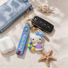 Miniso Sanrio Hello Kitty Cartoon Character Key Chain Holding Swim Ring Purple Polka Dot Dress Pendant Decor For Back To School Purse Handbag Accessory - Blue - View 3