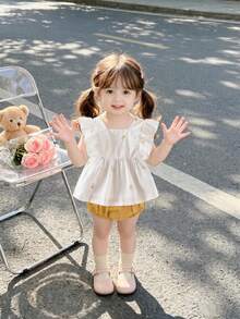 Conjunto de 2 piezas para bebé niña: blusa de manga corta con estampado floral y shorts de unicolor, para el verano - Amarillo - Ver 2