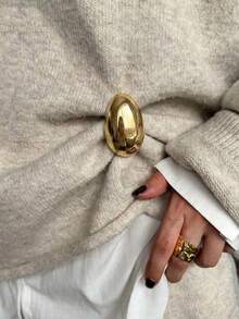 Egg-shaped Brooches In Multiple Colors