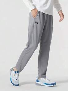 Under Armour 男女同款休閒直筒健身跑步訓練寬鬆運動褲 - 灰色 - 查看 1