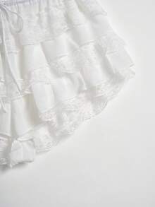 Pantalones cortos de mujer para verano, casuales, de vacaciones, color liso, con encaje, volantes multicapa y cintura con cordón - Blanco - Ver 10