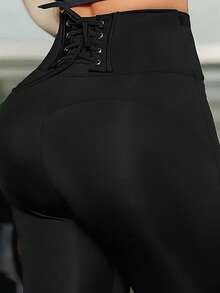 Pantalones ajustados de unicolor con cintura cruzada, atuendos de verano y primavera para mujeres en festivales de música, capri para mujeres en color negro - Negro - Ver 1