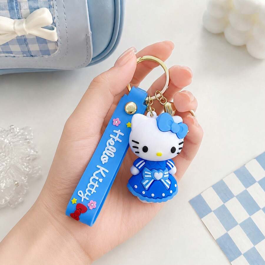 Miniso Hello Kitty 藍色包包掛飾鑰匙圈，可愛角色吊飾附矽膠繩與金色環，適用於背包、錢包、手提包、鑰匙，學校與旅行禮物 - 藍色的 - 查看 1