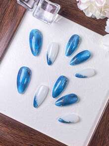 10 Pieces Of Handcrafted Almond-Shaped Nail Art In Blue/Black With Cat Eye Detailing And Fine Glitter. Accented With Silver Sequins. A Tie-Dye Design Exuding High-End, Luxurious, And Refined Elegance, Reminiscent Of Sinking Into The Ocean. Nails Handmade Press On Nails - Blue - View 5