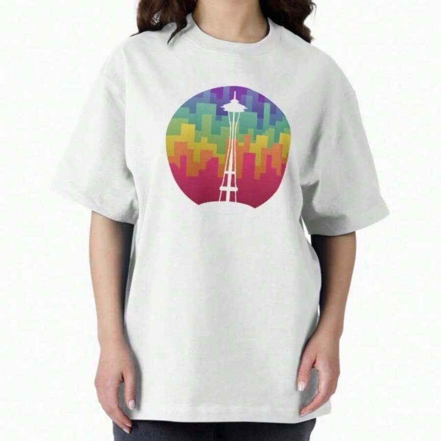 Camiseta con la aguja espacial frente a una ciudad colorida - Café integral - Ver 1
