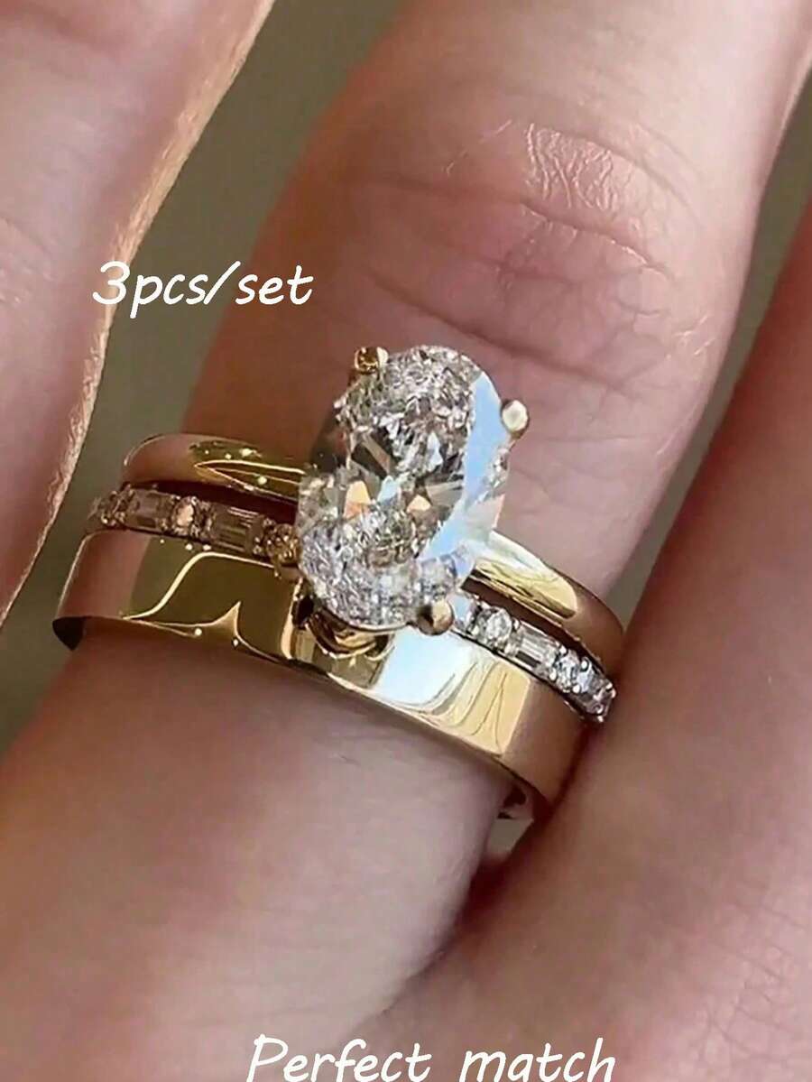 rundraw 4 pezzi Unico Set di Gioielli Nuziali con Zirconia Cubica Taglio Ovale, Anello di Fidanzamento Regalo, Anello di Promessa, Fede Nuziale e Anello Semplice, Adatto come Regalo, Gioielli Regalo di Natale e Capodanno - Dorato - Visualizzare 1