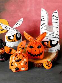 50pcs Halloween Rabbit Ear Shaped Plastic Gift Bags, Classic Pumpkin And Spider Web Print Storage Bags, Reusable Halloween Party Favor Bags, Holiday Table Decor, Carnival, Masquerade, Holiday Party Decoration Packaging Bags - Multicolor - View 2