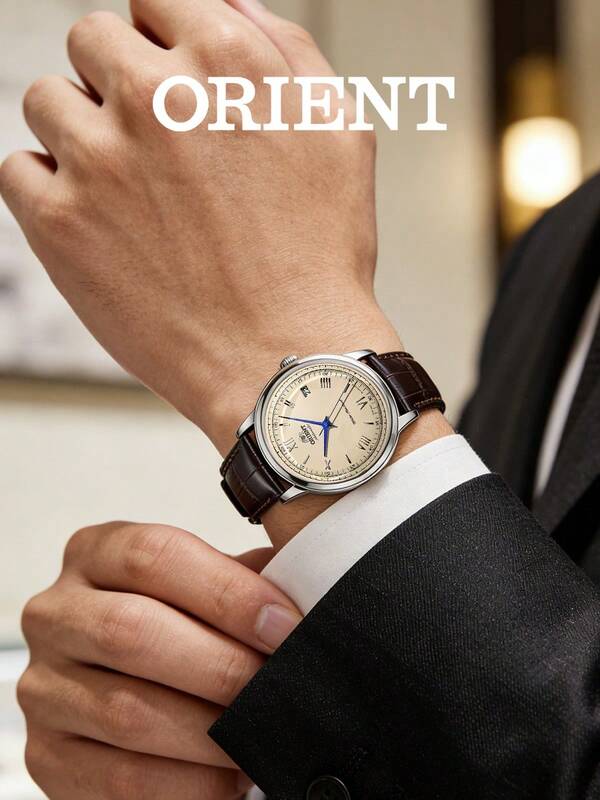 Orient Reloj de vestir automático mecánico para hombre FAC00009N0, esfera color champán, agujas azuladas, números romanos, caja de acero, correa de cuero marrón, indicador de fecha, estilo vintage.