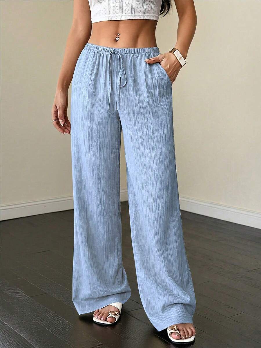 Women's Solid Color Wide-Leg Pants With Pockets And A Tie At The Waist - Blue 2 - View 1