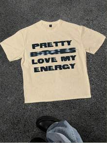 Camiseta Positive Vibe, con la frase 'PRETTY GIRLS LOVE MY ENERGY', diseño casual, suave, de manga corta, 100% algodón, 220 g/m². - Albaricoque - Ver 1
