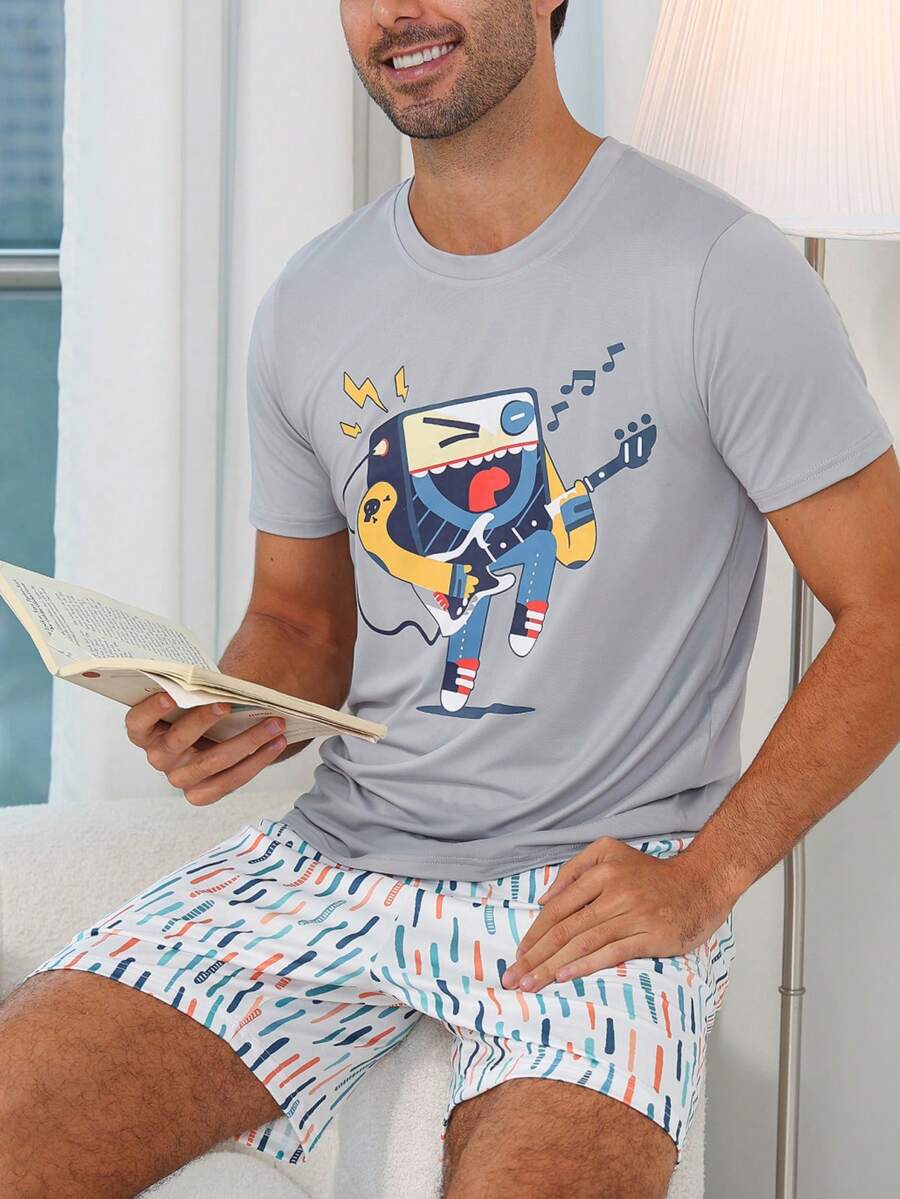 Conjunto de pijama masculino com top de manga curta com estampado de monstro de desenho animado da TV Rock & calções com estampado de salpicos de cor