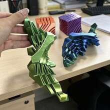 3D立方體可變形球壓力緩解玩具，具有光滑可拉伸的3D結構，一款創意便攜式指尖玩具。它具有視覺和聽覺雙重壓力緩解設計，可用作桌面裝飾，有助於緩解辦公室焦慮和壓力，放鬆身心。適合作為生日禮物、節日禮物或派對禮物，是一個絕佳的禮物選擇。 - 彩色 - 查看 2