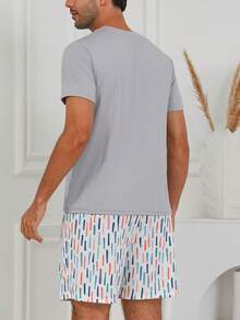 Conjunto de pijama masculino com top de manga curta com estampado de monstro de desenho animado da TV Rock & calções com estampado de salpicos de cor - Cinza claro - Ver 4