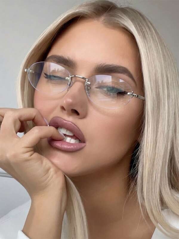 زوج واحد من نظارات نسائية بدون إطار بتصميم بيضاوي صغير وساق معدنية، موضة شخصية مزخرفة غير طبية