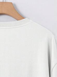 Una camiseta moderna con un diseño de una rana en pose meditativa, perfecta para chicos relajados que buscan un estilo casual. - Blanco - Ver 3