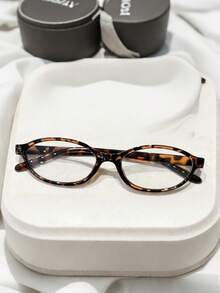 1 par de gafas de moda para mujer, montura ovalada de PC con estampado de leopardo, estilo retro minimalista, adecuado para estilo callejero y vacaciones - transparente - Ver 2